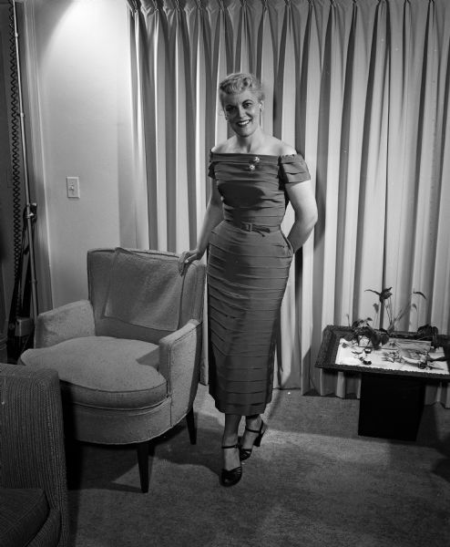 Portrait of June McGovern whose hair turned prematurely gray but has "dash and imagination." Eleanor Griffith, Irene Amundsen, Virginia Sylvester, Hazel VanWagenen, Grace Conklin, Elizabeth Uhlmeyer were also part of the photographic series.