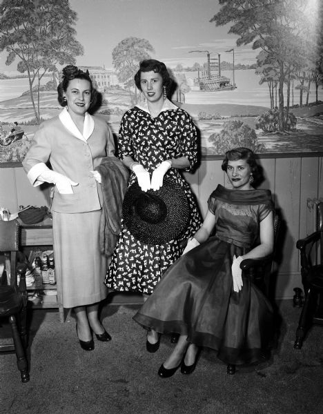 Group portrait of the Exchange Club style show models. They include, from left, Dolly Williamson, Mary Weston, and Nina Bonsack.