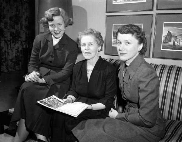Three members of Smith College Club, in Madison make plans for a dessert bridge party to benefit the Ruth Perry Neff Scholarship fund. Left to right are Mrs. R. W. (Onnolee) Stevens, 1237 Rutledge Street; Mrs. Leslie K. (Isabelle) Pollard, 301 Newcastle Way, former president of the Madison Smith Club, and Mrs. A. Richard (Virginia) Gross, 718 Harrison Street.
