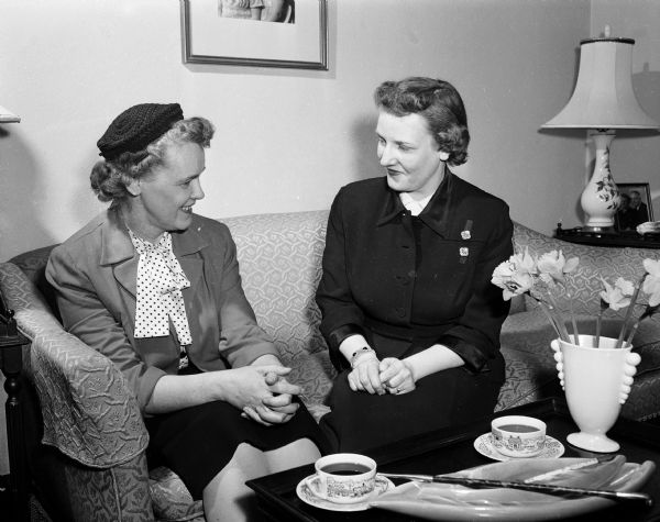 Miss Evelyn C. Nelson (left), supervisor of nurses for the Department of Public Health, and Mrs. Frank J. (Lois) Woerdehoff, city Round-Up chairman, make plans for the Summer Round-Up, a health project of the National Congress of Parents and Teachers for pre-school children starting school in the fall. It is sponsored by the Madison Council of Parents and Teachers in cooperation with the Madison Board of Health.