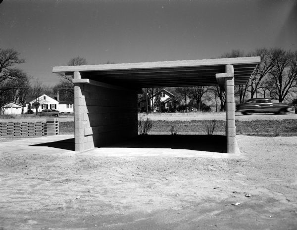 Sample of a concrete block carport. Building materials were available at the Buildex Company, 4519 West Beltline Highway.