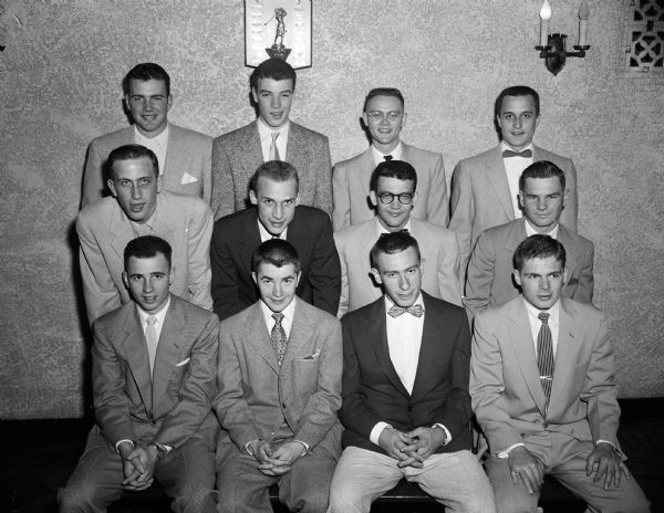 Group portrait of West Side Business Men's Association's selections of guests on a Home Talent Baseball League excursion to a Braves game in Milwaukee. The boys include three from each High School: West, Central, Edgewood, and Wisconsin High. Front row left to right: Phil Pittz, John Clayton, Gordon Corcoran, Richard Wills. Second row:  Paul Geier, Roderick Groves, William Hammill, Robert Craig. Third row: Jim Holmes, Harrison Smith, Ralph Johnson, Donald Hensen.