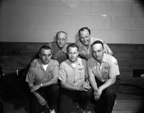 Group portrait of the Rohde's Steak House bowling team, Madison Bowling Association's seasonal high count winners in the Lark Major League. They are, from left, Bill Lazarz, Joe Hackett, Dean Johnson, Obie Quam, and Dan McCarthy.