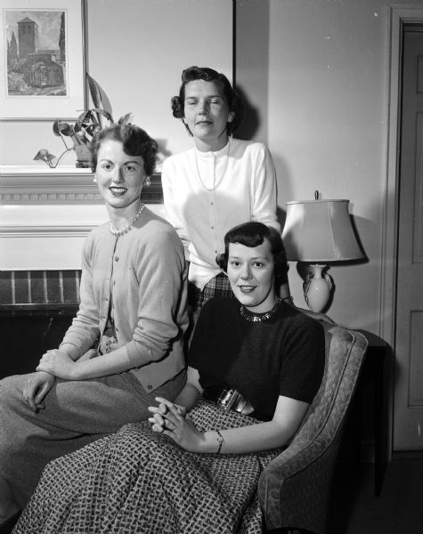 Kappa Kappa Gamma alumnae committee members Barbara Johnson (left), Mary Beach, and Carol Sturm plan a benefit dance.