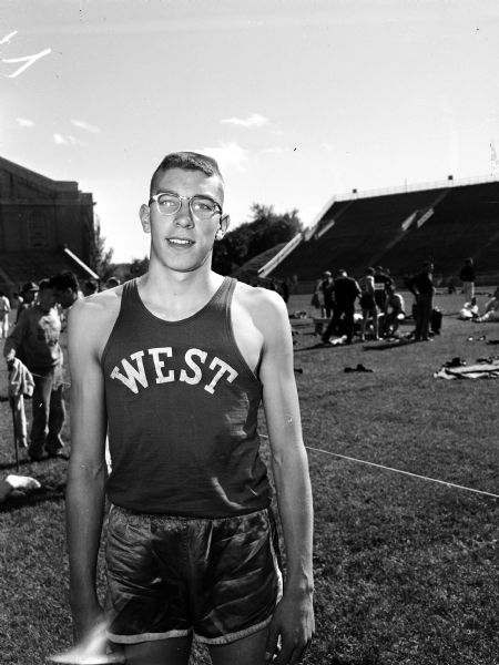 Portrait of Lance Olson of Green Bay West, after setting a new record in the high jump at the state high school track meet at Camp Randall Stadium.