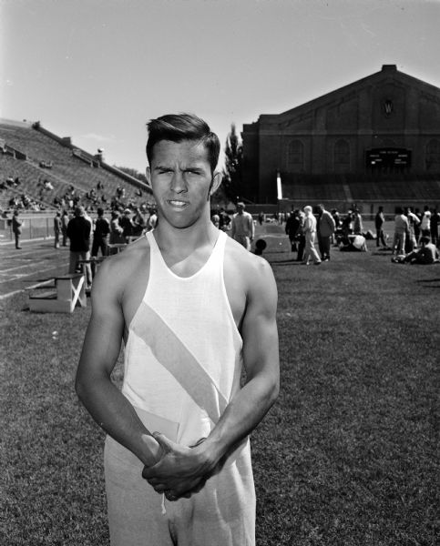 Portrait of Tom Brockley of Baraboo, after setting a new record in the 440-yard dash at the state high school track meet at Camp Randall Stadium.
