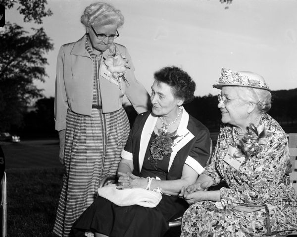 Former teachers at East High School converse at a reunion held at Maple Bluff Country Club. Shown left to right are three retired East High teachers: Violet Hughes, 2125 Oakridge Avenue; Mable H. George, 604 E. Gorham Street; and Stella T. Patton, 816 Oakland Avenue.