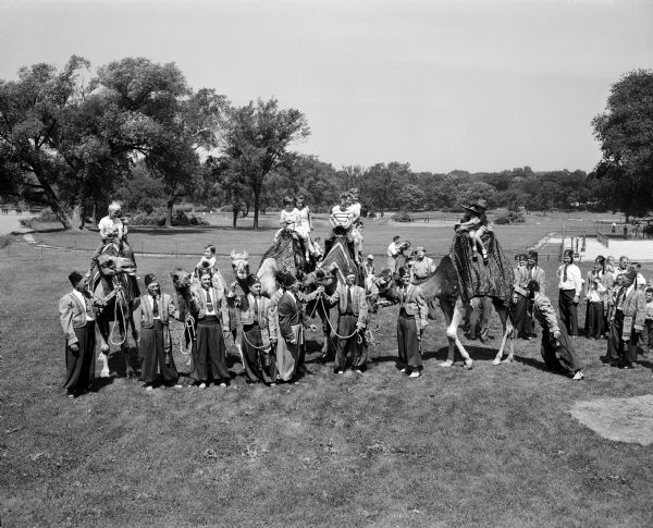 Zor Shrine members with their camels at Madison's Vilas Park Zoo. The shriners give rides to children every Sunday morning on their camels, housed at the zoo.