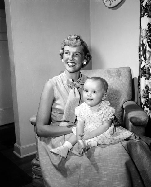 Portrait of Jane Hilsenhoff and her daughter, Leslie Jane. They are from Frederick, Maryland, and are visiting the home of her husband's parents, Mrs. and Mrs. Raymond Hilsenhoff, 1037 Seminole Highway.