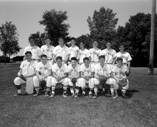 Group portrait of the Arlington baseball team in uniform.