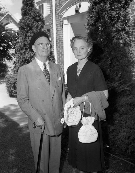 Portrait of Lutheran pastor Edwin Moll with his wife, in Madison to visit his son. Pastor Moll was pastor of Luther Memorial Church from 1937 to 1939. He has lived in Jerusalem as director of the Lutheran World Federation for the Near East since 1946.