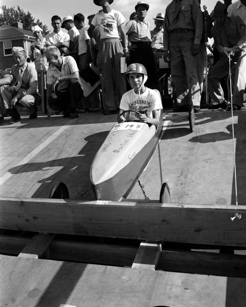 David Laverty of Mineral Point sitting in his racer at the starting line at the 1954 Madison soap box derby. He was a runner-up in the class B, and his brother, Larry, was the 1952 champion.