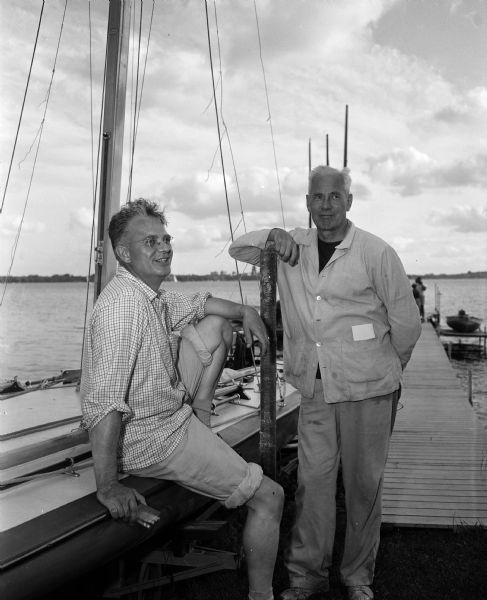 The 53rd annual Inland Lake Yachting Association Regatta hosted by the Mendota Yacht Club is held in Madison on August 22, 1954. Pictured are Lucien Hanks, general chairman of the regatta, and his assistant, H. Kenneth Harley.