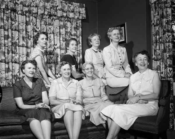 Group portrait of the members of the Civics Club Board for the 1954-1955. First row: Florence Lanning, Garnet Lowe, Mary Garner, and Doris Grove. Second row: Carla Leveque, Rosanna Ragatz, Louise Gonce, and Mrs. Edward J. Young.