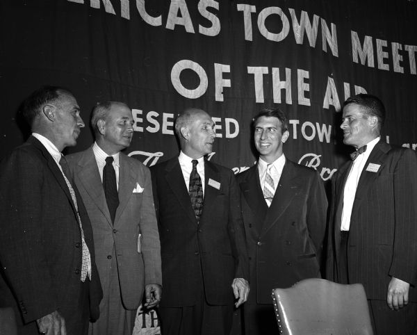 Group portrait of members of the American Association for State and Local History who participated in the "America's Town Meeting of the Air" radio broadcast. They are, left to right: Professor Richard Overton from Northwestern; Professor Broadus Mitchell, Rutgers; Albert B. Corey, NY State Historian; James F. Murray, Jr., NY; and Clifford Lord, Wisconsin State Historical Society director.