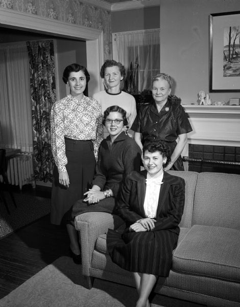 Group portrait of five club officers of the Army Officers' Wives' Association. They are, seated left to right: Dorothy Freck, first vice-president; Elsie Benedict, president; standing, Madelyn Brown, secretary; Edythe Myers, second vice-president, and Lottie Hatfield, treasurer.