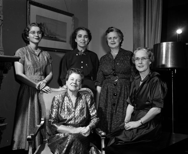 Five members of Alpha Delta Kappa, an honorary education sorority, are shown at their Founders' Day Banquet. Seated are: Mrs. Charles Parker, president, Alice Griggs, chairman of the program. Standing from left to right are Mrs. Thomas James, Tomah, Jennie Hickey, and Florence Kessenich who assisted with arrangements.