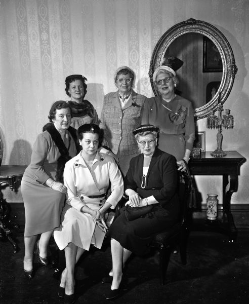 Six representatives from Madison clubs assist in the annual Christmas seal sale to aid in the fight against tuberculosis. Left to right, in the front row are Miss Esther A. Weddig, 1702 Yahara Place, East Side Women's Club; Mrs. Curtiss D. Brauhn, 3110 West Beltline Highway, West Side Business Men's Association Auxiliary and Mrs. Elmer C. (Monica) Anderson, 409 South Randall Avenue, Catholic Women's Club.
In the second row are Mrs. Francis (Mary E.) Strapp, 664 Crandall Street, Who's New Club; Mrs. Walter W. ( Mildred) Horne, 1204 Rutledge Street, Madison Woman's Club and Mrs. H.J. Goodman, 1 East Gilman Street, Council of Jewish Women.