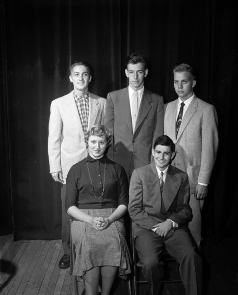 Officers of the Wisconsin Association of Student Councils for 1955, elected at the two-day annual convention at Madison Central High School. Seated are: Bety Lou Cooper of Seymour (left), secretary, and Jerry Bower of Merrill, president. Standing (left to right) are: Ted Cole of Madison East, vice-president; Dick Bromley of Superior, and James Flynn of Racine Washington Park, directors.