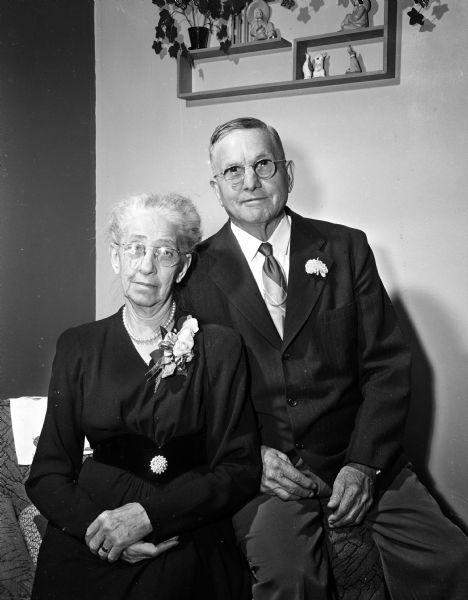 Portrait of Mr. and Mrs. Edward (Kathryn) Haushalter on their golden wedding anniversary. They farmed near Muscoda before moving to Madison.