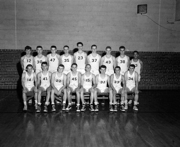 Group portrait of Edgewood High School basketball team.