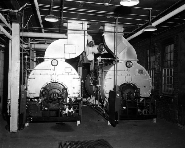 Two large boilers (?) at the Ohio Chemical and Surgical Equipment Company, 1400 East Washington Avenue.
