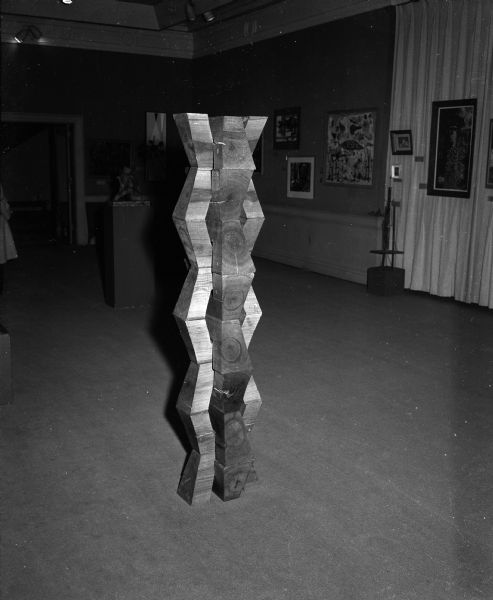 "Endless Column", an award-winning wood sculpture by Hugh Townley, is on display at the Wisconsin Salon of Art.