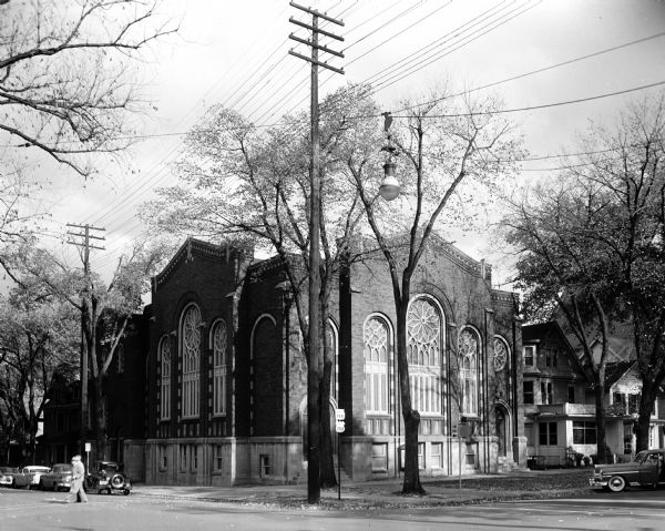 Exterior view of the Evangelical United Brethren Church building at 223 Wisconsin Avenue and East Johnson Street, taken at the time of the congregation's centennial.