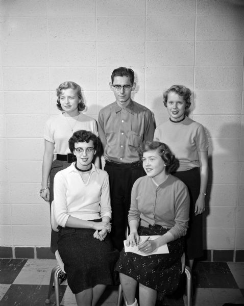Group portrait of the members of the committee for the semi-formal dance, sponsored by the sophomore class at Monona Grove High School. They include, from left, in front row, Virginia Raynoha, refreshments; and Sharon Ersland, decorations.  
Standing are, left to right, Morlynn Parker, ticket sales; David Thuesen, lighting, and Ellyn Otterson, band. Norm Kingsley's band will play for the dancing.