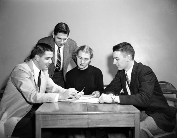 University of Wisconsin student leaders take action against discrimination in private-owned housing. They include, from left: Norman Barton, Frank Chalk Helen Rehbein, and John Kelsh.