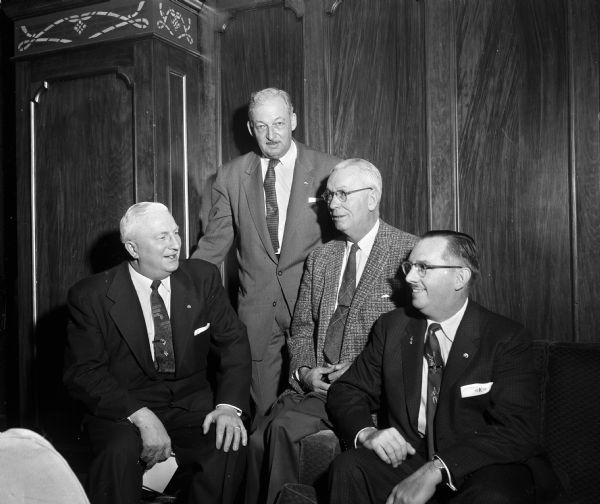 Portrait of the leaders at a state meeting of the United Commercial Travelers Insurance Company. They include, from left: J.J. Prokop, Madison; Willliam Baxter, Pewaukee; George Limpert, Appleton; and Voris King, Lake Charles, Louisiana.