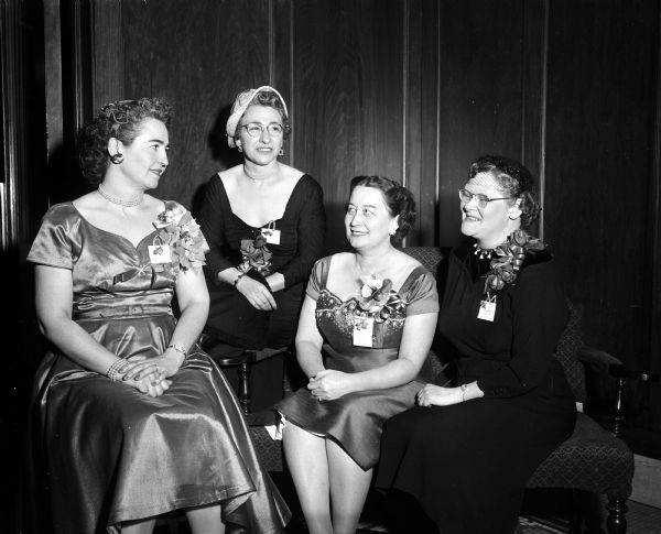 Four delegates to the state meeting of the United Commercial Travelers insurance company include, left to right: Virginia Lee Frost, Madison; Mrs. William Bazter, Pewaukee; Mrs. Lester Markowardt, Manitorwoc, and Mrs. Voris King, Lake Charles, Louisiana.