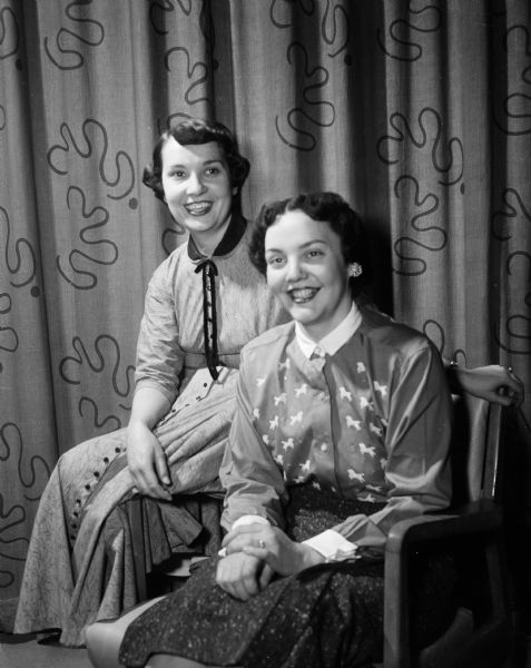 Portrait of the two planners of the annual Jaycette style show held at the Wisconsin Union Theater. They include Rita Peterson, director of production, and Mrs. Harry Stoll, general chairman of the show.