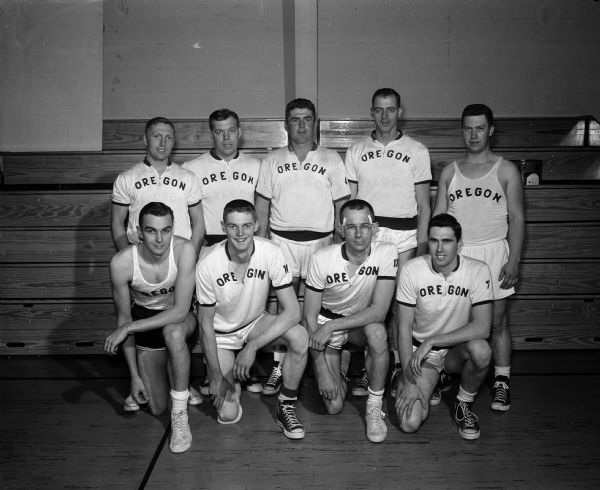Group portrait of Oregon High School basketball players in uniform.