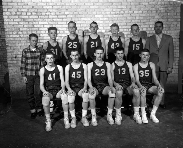 Group portrait of the Spooner High School basketball team, the Railroaders.