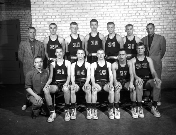 Group portrait of the Shawano High School basketball team, the Indians.