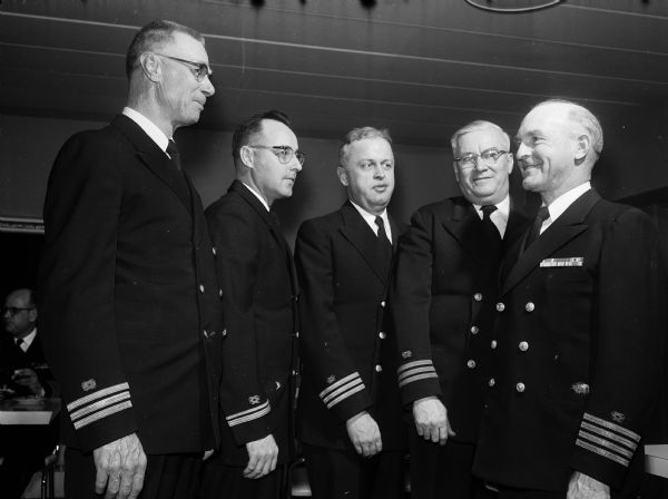 Members of the Naval Reserve Composite Company at the retirement dinner for Capt. Reed A. Rose include (left to right): Comdr. Elmer Cullen, Lt. (j.g.) T.J. Hart, Comdr. Oliver Munz, Comdr. W.J. Landwehr, Capt. R.O. Lord.