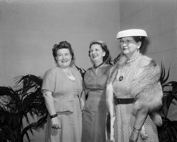 These women attended the Elks State Convention in Madison. Left to right are: Mrs. William Eulberg, Portage, wife of a state trustee; Margaret Mapes, wife of the past ruler of the Madison Elks Lodge and co-chairman of the ladies activities at the convention; and Mrs. Frank Fischer, Janesville, wife of a state trustee of the Elks Lodge.