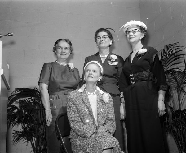 Attending the luncheon for wives of Elks Club members are, (seated): Mrs. Arno Miller, Portage, wife of the new president of the Wisconsin State Elks Association; and, left to right: Mrs. Arthur Chadek, Milwaukee, wife of the state organization's first president-elect; Mrs. Bert Becker, Marshfield, wife of the vice-president northeast of the state association; and Mrs. Leo Schmalz, Kaukauna, wife of the state secretary.