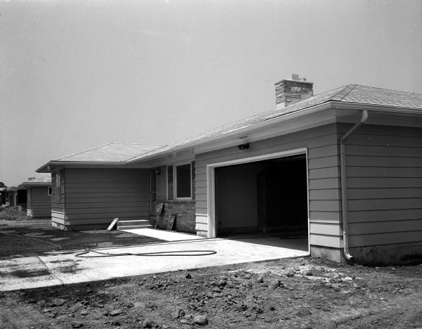 Two-car garages are in 15 out of the 18 homes in the Parade of Homes. This home has been identified as being located at 5514 Raymond Road and built by Joseph Daniels Construction Company.