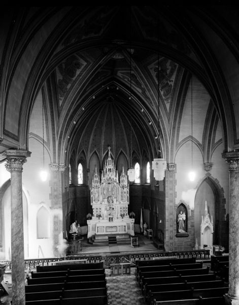 Interior view of St. Joseph's Catholic Church, Baraboo, decorated by Clemens Rath.