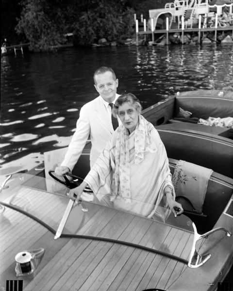 Rajkumari Amrit Kaur, India's minister of welfare and health, is shown in a speedboat on Lake Mendota with Dean John Z. Bowers, of the University of Wisconsin Medical School. She was in Madison to speak at the opening session of the 36th annual state 4-H Club Week.