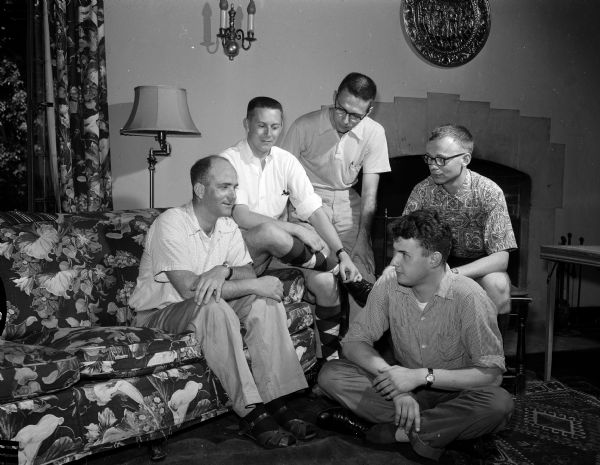 Seminarians from Nashotah House, near Milwaukee, attend the institute for summer church schools at St. Francis Episcopal Student Center. Seated on floor is Robert Brown of Milwaukee. Other seminarians are John Hills of Blue Island, IL; John Rossner of Dedham, Mass; John Harrison Heidt of Milwaukee; and Donald Radtke of Milwaukee.