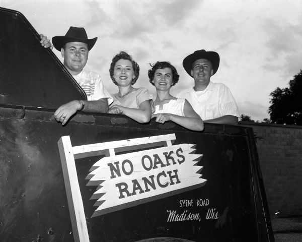 The rodeo committee of the Madison Lions Club and their wives were hosts of a barbecue party at the Frank Holmes home, No-Oaks Ranch on Syene Road.
Left to right, Jack Mueller, 700 Graham Drive.; Mrs.(June) Mueller; Mrs. Harland (Margaret) Klipstein, 4202 Kenwood Drive. and Mr. Klipstein.