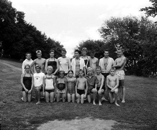 Group portrait of winners in the Madison Swimming Meet city finals, held at B.B. Clarke beach.
