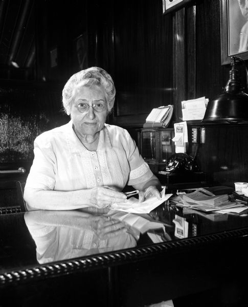 Portrait of Alfreda Fauerbach, president and treasurer of O.M. Nelson and Son jewelers, after 50 years of service with the firm.