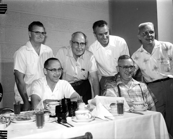 More than 113 secretaries of bowling leagues affiliated with the Madison Bowling Association gather at the Eagles Club for their annual fall meeting. Front row are William Ackerman and Mel Schwenn, both of Sun Prairie. Back row are Stan Rinden, Mc Farland; Al Morgan, Madison; Russ Albers, Madison and president of the MBA Jim Johnson, Madison.