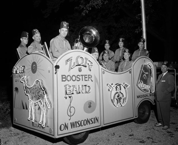 A band gathers in the Zor Shrine Booster Band Wagon.