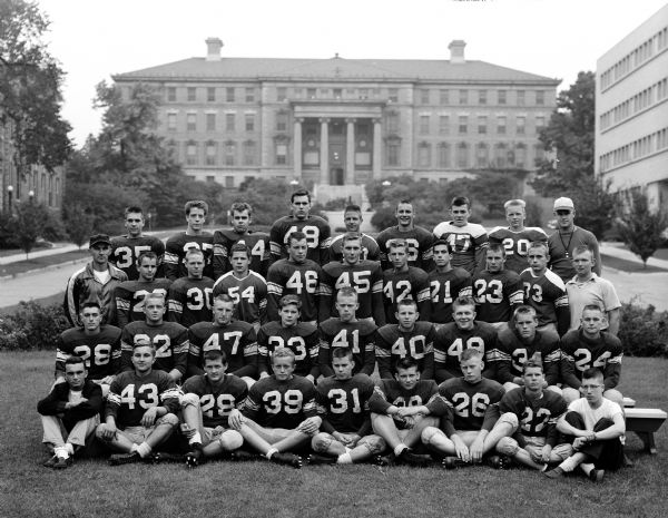 Group portrait of the Wisconsin High School football team posed on the Henry Mall.
