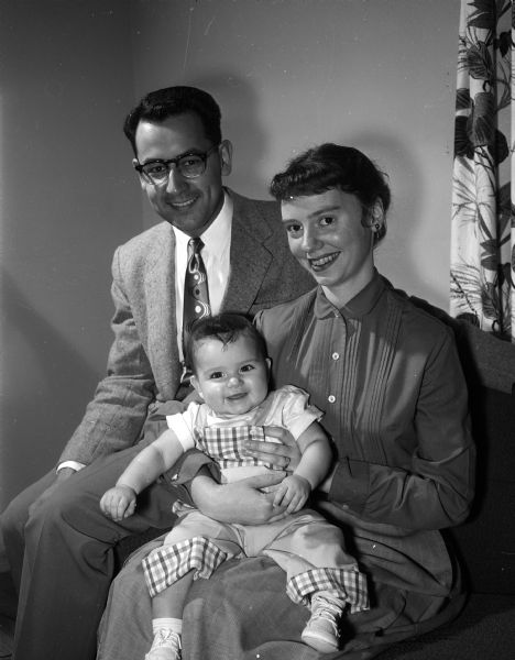 Rev. Norman W. Jackson poses for a portrait with his wife, Faith, and six-month-old daughter, Nancy Beth. Rev. Jackson is to be the pastor at the Orchard Ridge Congregational Church after serving a church in Osseo, Wisconsin.